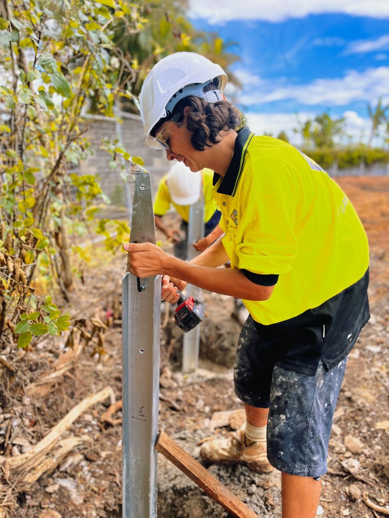 DR Landscaping team building concrete retaining wall in Gympie